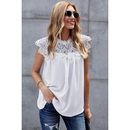 Valkoinen koristekirjailtu...