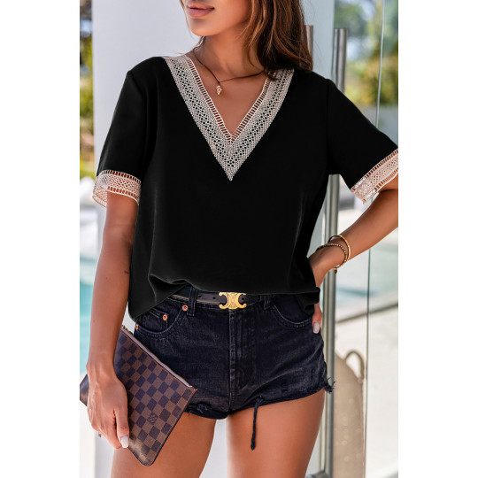 Svart kortärmad dekorativ...