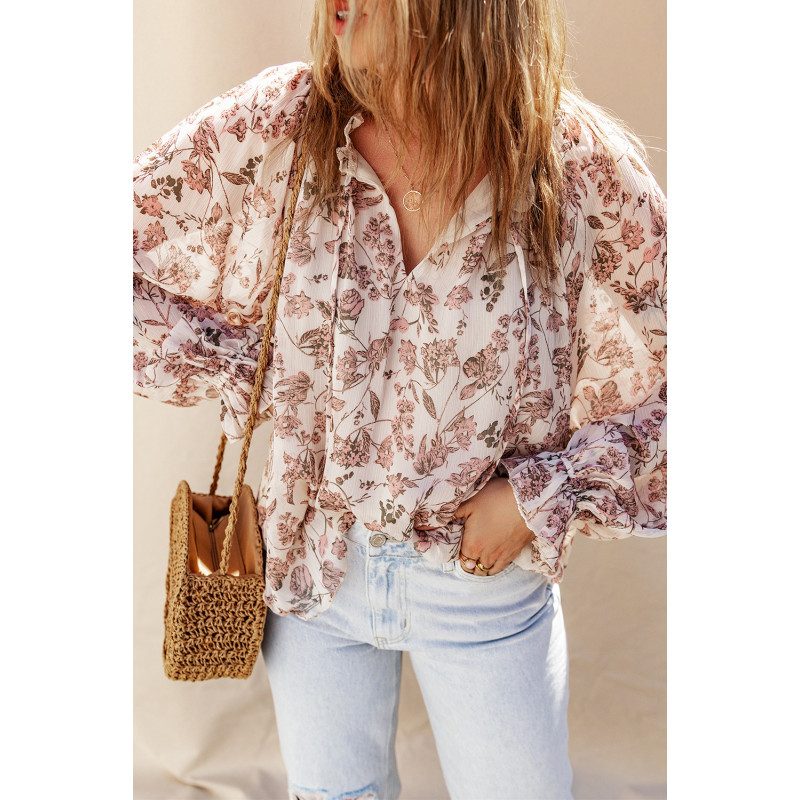 Vitrosa påsärmad blus med blommönster