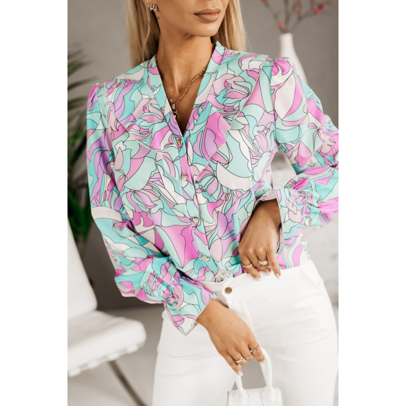 Lila/turkos blus med volanger
