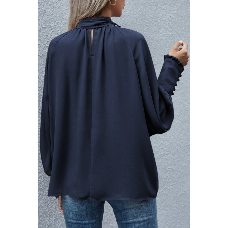 Mörkblå blus med fluga – kuva 2