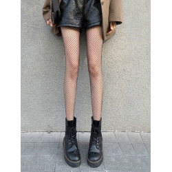 Mustat pieniaukkoiset verkkosukkahousut